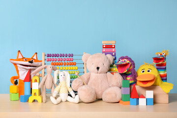 Obraz premium Collection of different toys on wooden table