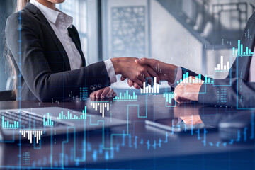 A handshake as a symbol of successful transaction on brokerage services at international investment...