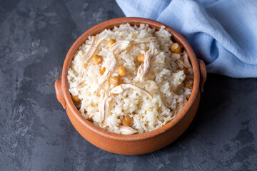 Traditional delicious Turkish food; Rice with chickpeas and chicken (Turkish name; Tavuklu nohutlu pilav or pilaf)