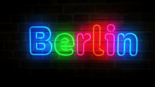 Berlin neon symbol on brick wall. Light color bulbs with romantic city sign. Loopable and seamless abstract concept animation.