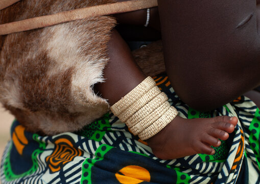 Mucubal child with wooden ankelts, Namibe Province, Virei, Angola