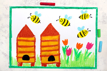 Colorful drawing - flying bees and beehives in a meadow