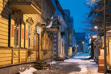Parnu, Estonia. Night View Of Hospidali Street With Old Buildings And Houses In Evening Night Illuminations.
