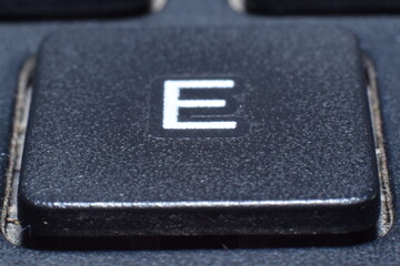 ISOLATED CLOSEUP OF ENGLISH ALPHABET BUTTON  ON  LAPTOP KEYBOARD 