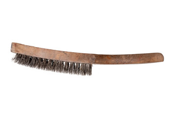 Close-up of a steel wire brush with wooden handle isolated on a white background. Used for cleaning...