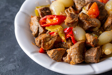 Traditional Turkish meal with delicious meat; onion stew with meat (Turkish name; etli sogan yahnisi, et kavurma)