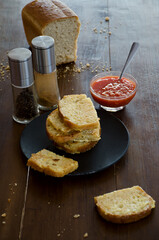 toast, bread and tomato sauce on the table