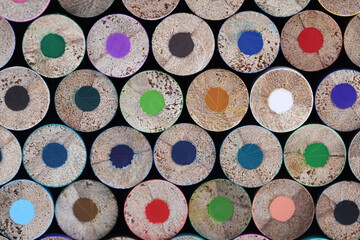Many blunt multicolored wooden pencils closeup background