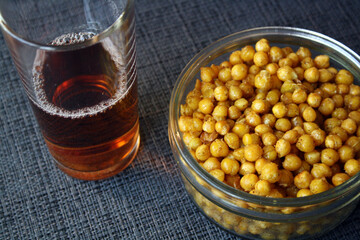 Roasted chickpeas with spices. Appetizer for drinks.