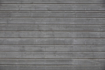 Obraz premium Texture of a wooden wall from gray painted boards. Natural vintage wood background