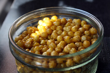 Roasted chickpeas with spices. Appetizer for drinks.