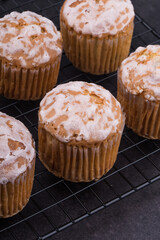 delicious fresh muffins on a wire rack.