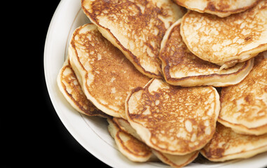 Russian pancakes are on the plate