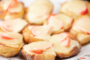 Baked bread with egg, cheese and tomatoes