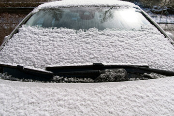 car windshield cover after snowfall