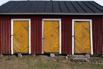 three old wooden doors, Lappeenranta Finland