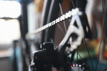 Fototapeta premium Closeup of mountain bike chain in workshop