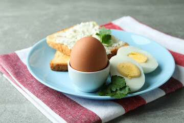 Concept of tasty breakfast with boiled egg, close up