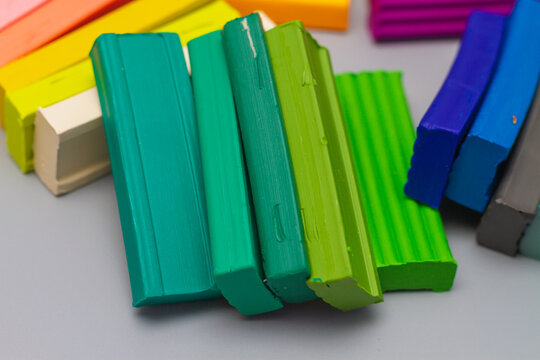 Pieces of new multi-colored plasticine for modeling and molding children at school, kindergarten, home
