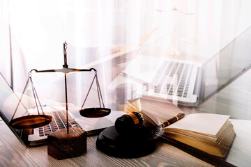 Business and lawyers discussing contract papers with brass scale on desk in office. Law, legal...