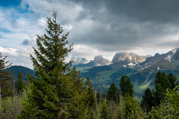 peaks of Gantrisch Ridge in clouds