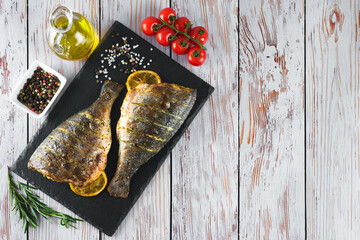 Grilled fish with roasted with lemon and spices