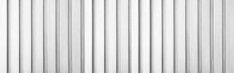 Panorama of New White vintage wooden wall texture and background seamless or a white wooden fence