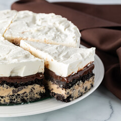 Layered chocolate and coffee ice cream pie, ready for serving.