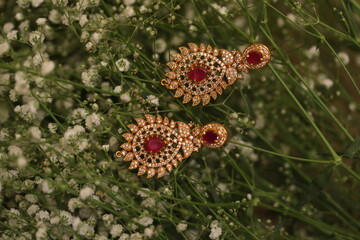 diamond earring on filler flowers