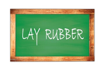 Obraz premium LAY RUBBER text written on green school board.