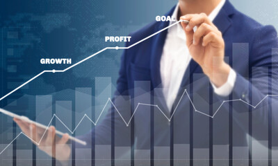 Growth success developments to goals concept. Businessman forecast analysis plan profit chart with pen and increase of positive indicators. Graph business stock turnover financial plan year. 