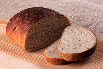 Traditional Loaf of Latvian sweet and sour bread on the table. Sweet Rye bread