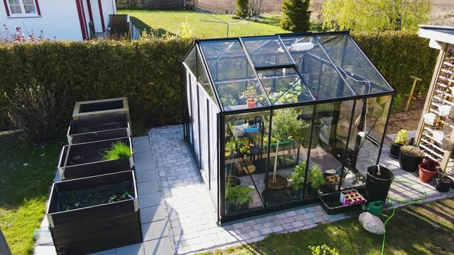 Modern outdoor growbeds and greenhouse 4k