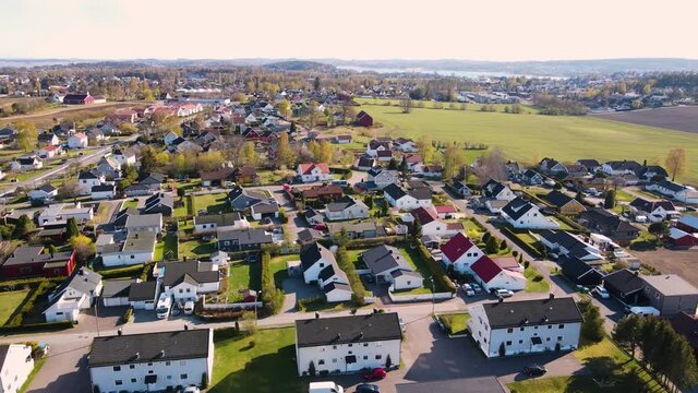 Aerial drone shot of a suburban ocean town in Norway 4k