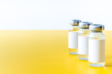 Vaccine vials. Covid vaccine in bottles. Vaccination concept