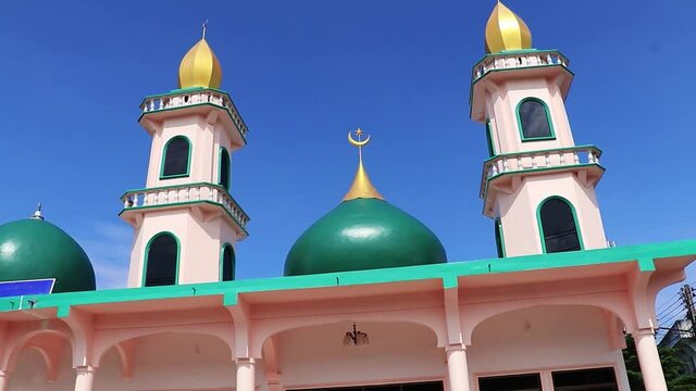 Gold turquoise Thalang Mosque Lil Abidin Mosque architecture Phuket Thailand.