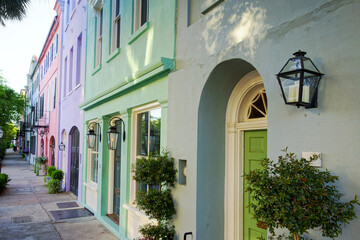 Fototapeta na wymiar Brightly painted homes known as Rainbow Row on East Bay St in Charleston South Carolina