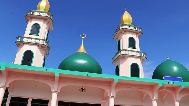 Gold turquoise Thalang Mosque Lil Abidin Mosque architecture Phuket Thailand.