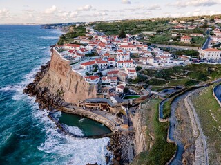 Fototapeta na wymiar Aerial view of Azenhas do Mar, a small township along the wild Portuguese coastline facing the Atlantic Ocean, Colares, Portugal.