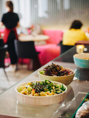 Poke bowl with cabbage, avpcado, pineapple, tomatoes