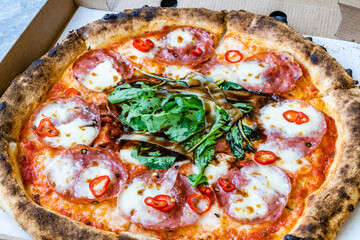 Take Away Tasty Pepperoni Pizza and Cooking Ingredients Basil.