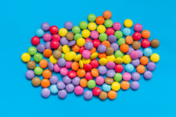 Background of many colourful round Halloween candies
