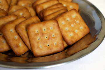 cashew cookies on white indian biscuits wheat biscuits in the plate white background