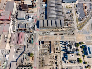 Aerial view of a giant quarry and construction site at Ecometais, a Treatment and recycling plant in Aldeia de Paio Pires industrial area, Setubal, Portugal.