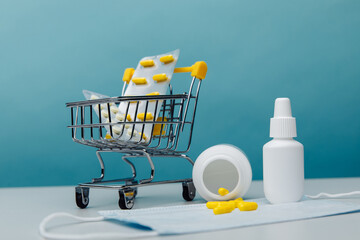 Shopping trolley with medical goods close-up