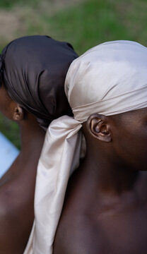 Closeup of young men in do-rags