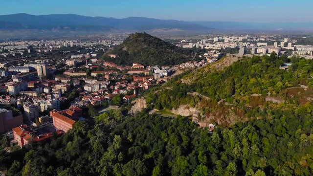 Alyosha Monument, Plovdiv, Bulgaria. 36 foot tall reinforced concrete statue of a Soviet soldier on Bunarjik Hill. Beautiful scene of city took with aerial drone 4K 30fp