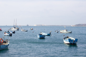 Boats anchored in the black sea in sunny moring