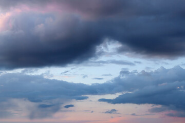 Dramatic storm clouds on the evening sky after sunset.