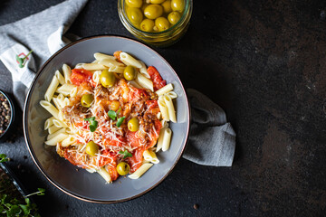 Eggplant penne Pasta alla Norma or Amatriciana guanciale Rigatoni tomato sauce cheese vegetable second course snack trend meal copy space food background rustic 
